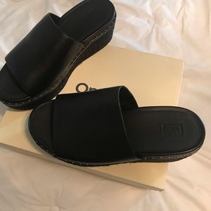 Fit Flop mules Size 7 super cute and comfy! Very comfortable. Never worn.